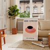 Black and orange typographic kitchen poster reading 'More Espresso Less Depresso'