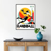 Dynamic handball player in action with Paris skyline backdrop - in a black frame