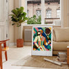 Vintage tennis scene with bold colors and retro typography - in a Parisian living room with a sofa and a fig plant
